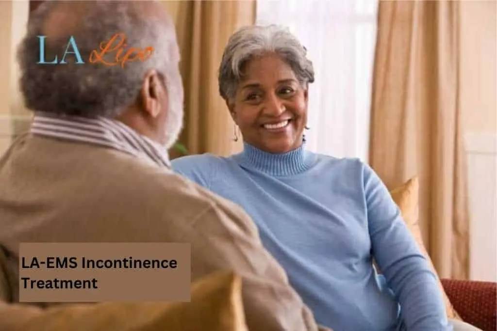 Couple sat smiling at each other - LA-EMS treatment Staffordshire